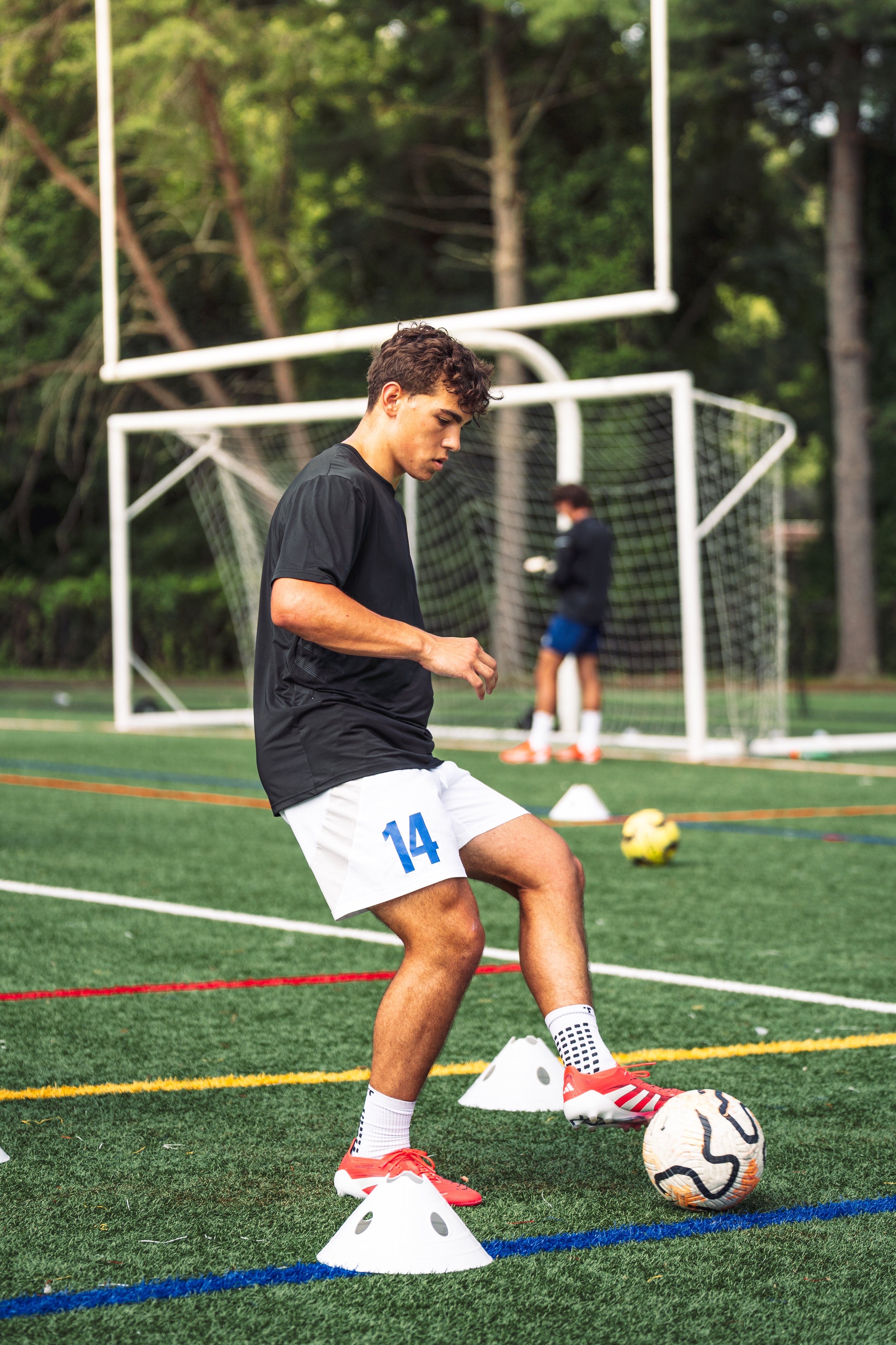 Player performing cone drill training